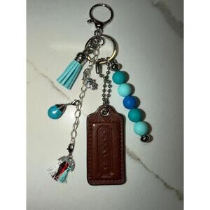 Brown Medium Coach Hangtag with a fashion handmade charm